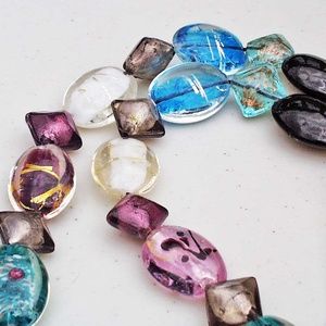 LAMPWORK GLASS LG OVALS WITH METALLIC ACCENTS AND PUFFED SQUARES NECKLACE,